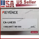 One New Keyence CA-LHE35 Camera Lens. Fixed Price $582.25.