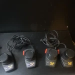 Sears Black Wired Plastic Paddle Video Game Controllers Set Of 4. Fixed Price $20.00.