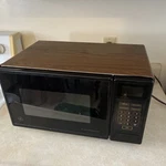 Vintage Compact General Electric JE690T003 Woodgrain Microwave Working 1992. Fixed Price $80.00.