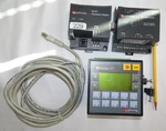 Unitronics EX-A1, IO-AI4-AO2 V4.0, V120-22-UA2 Vision 120, EX1-CA400 Cable (229). Fixed Price $490.00.