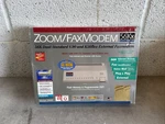 New Sealed - Zoom 56KX Dual Standard External Fax Modem Model 2949. Fixed Price $24.99.