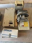 Omron PRO27 Programming Console With Accessories Rom-h, Power Supply, AP003. Fixed Price $250.00.